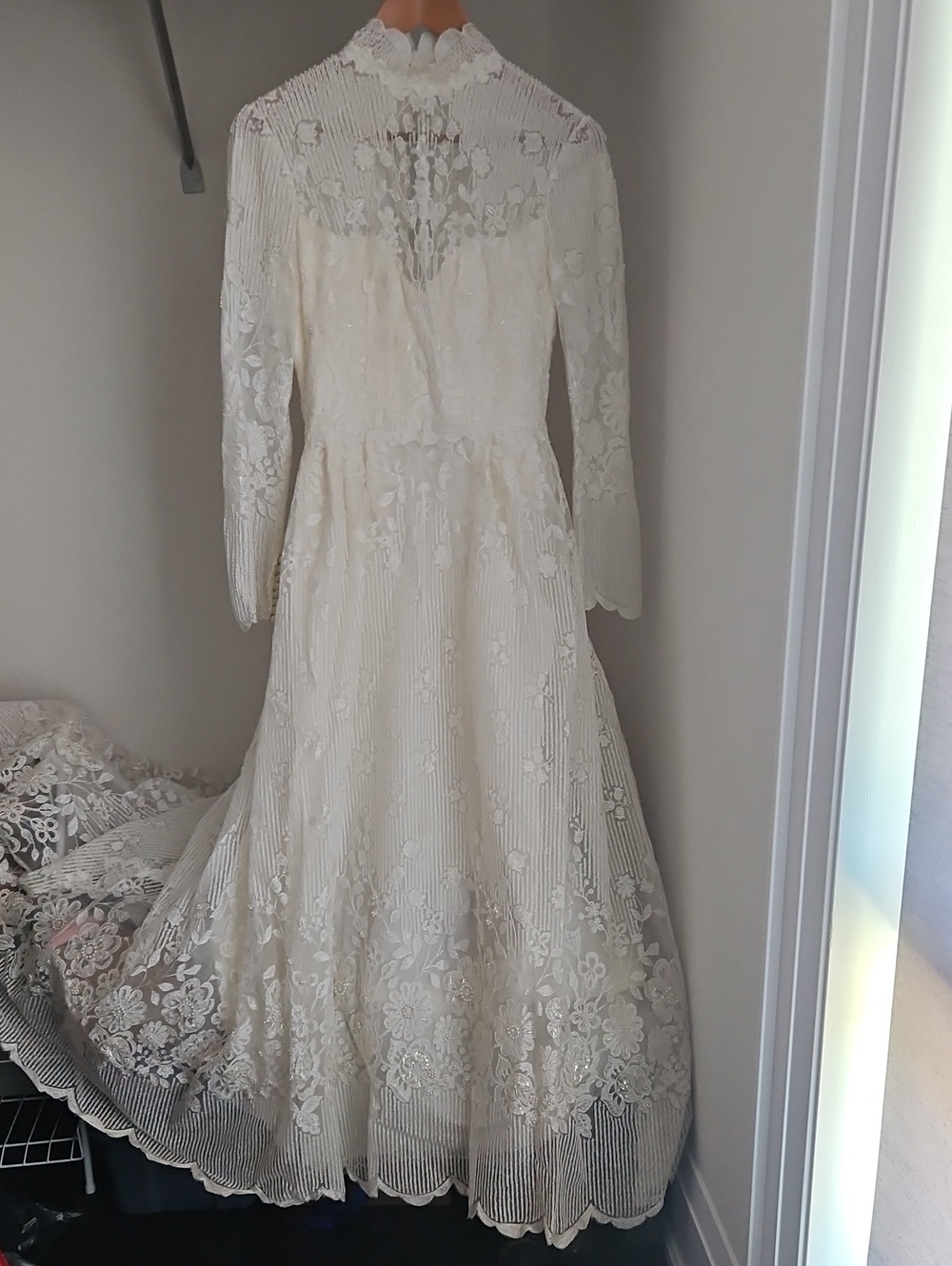 Elegant Ivory Long-Sleeve Lace Wedding Dress with High Neck